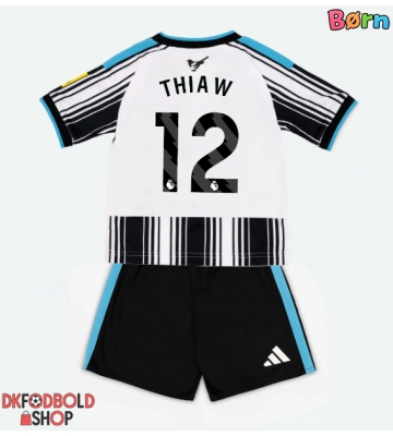 Newcastle United Malick Thiaw #12 Hjemmebanesæt Børn 2026-27 Kort ærmer (+ korte bukser)